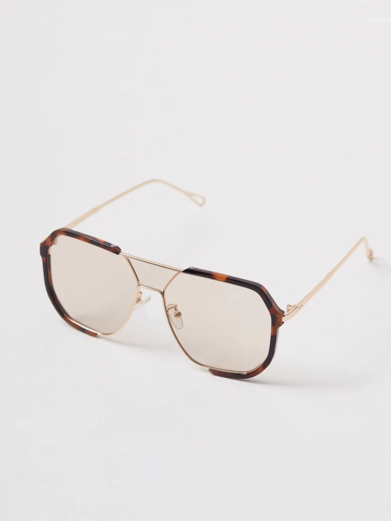 Gold sunglasses with animal-print frames