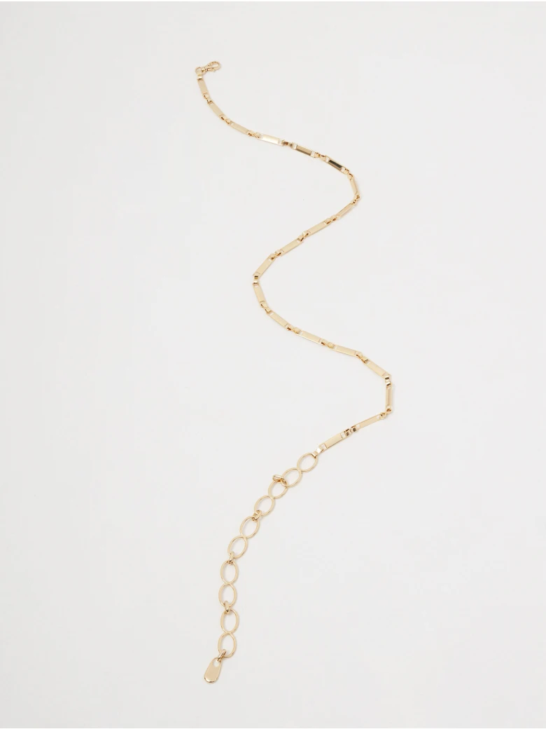 Gold-colored chain belt