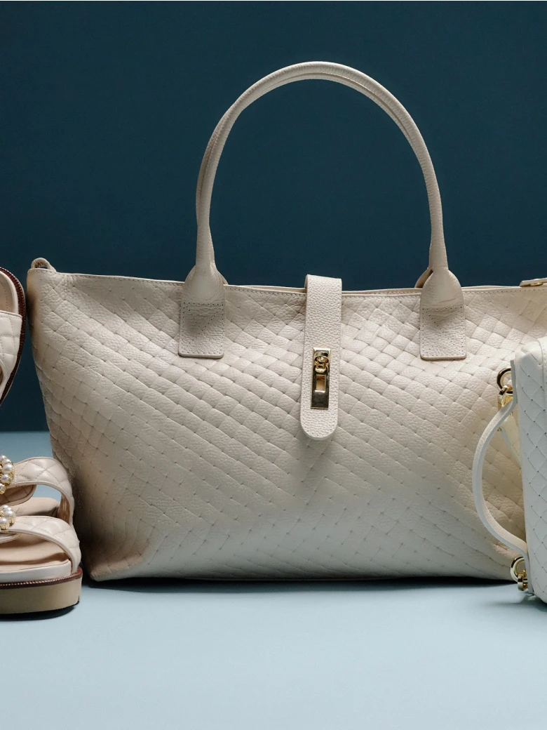 Cream-colored hobo bag made of genuine leather