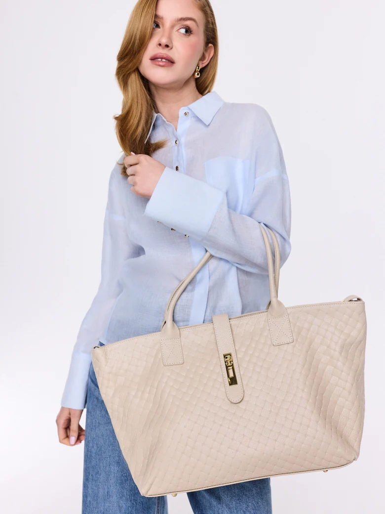 Cream-colored hobo bag made of genuine leather