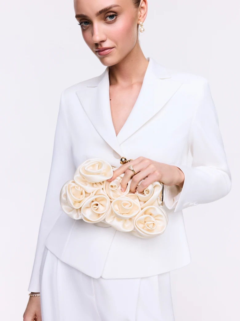 Cream-colored floral clutch