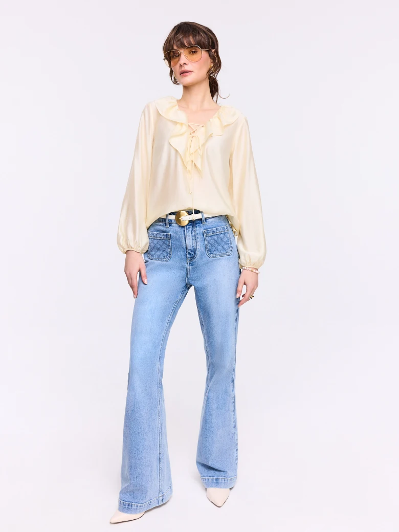 Elegant blouse with tie detail in butter color