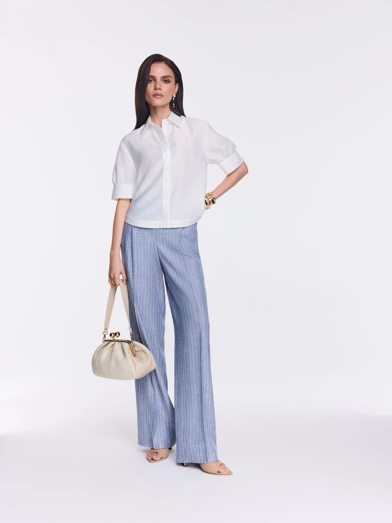 An elegant white short-sleeved shirt