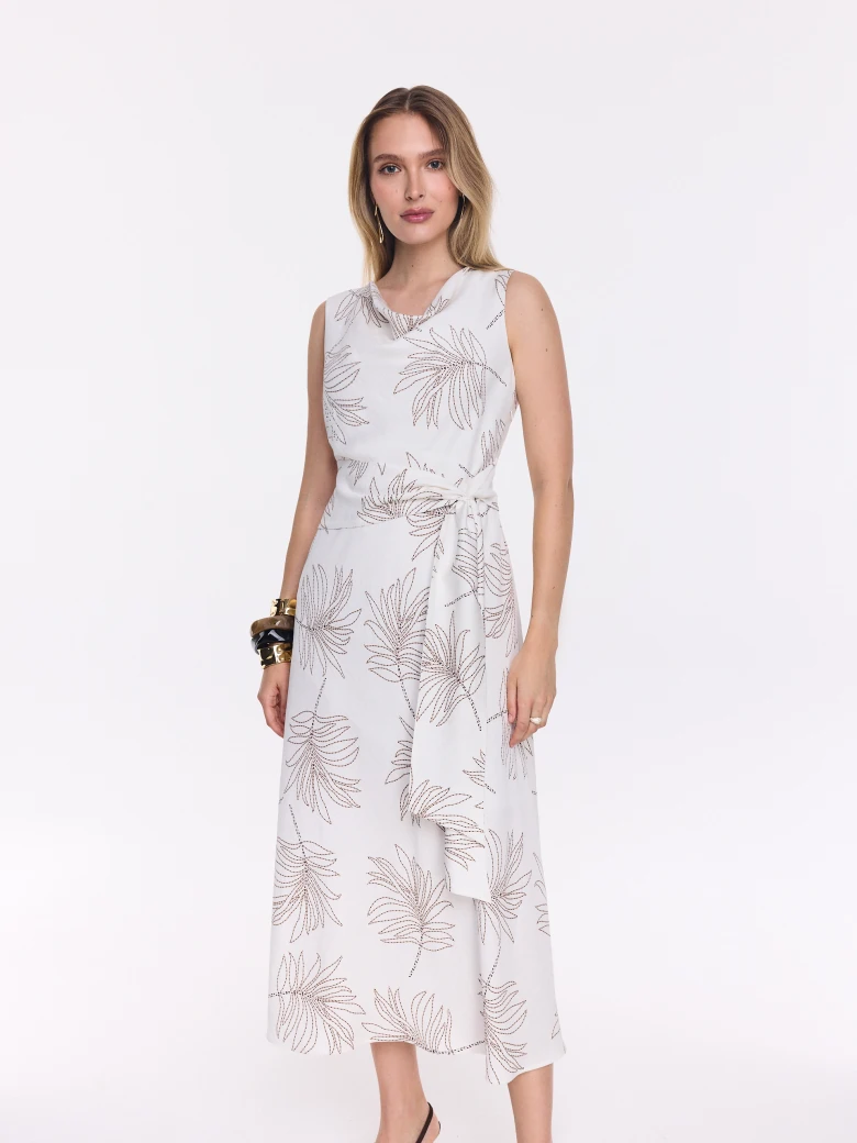 White midi dress with a leaf pattern