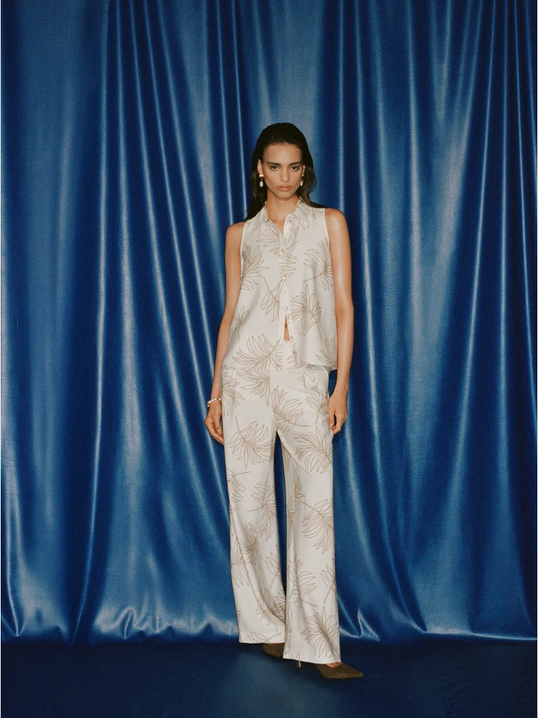 White wide-leg pants with a floral print