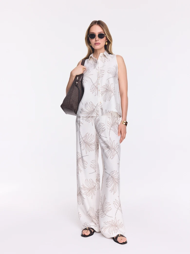 White wide-leg pants with a floral print
