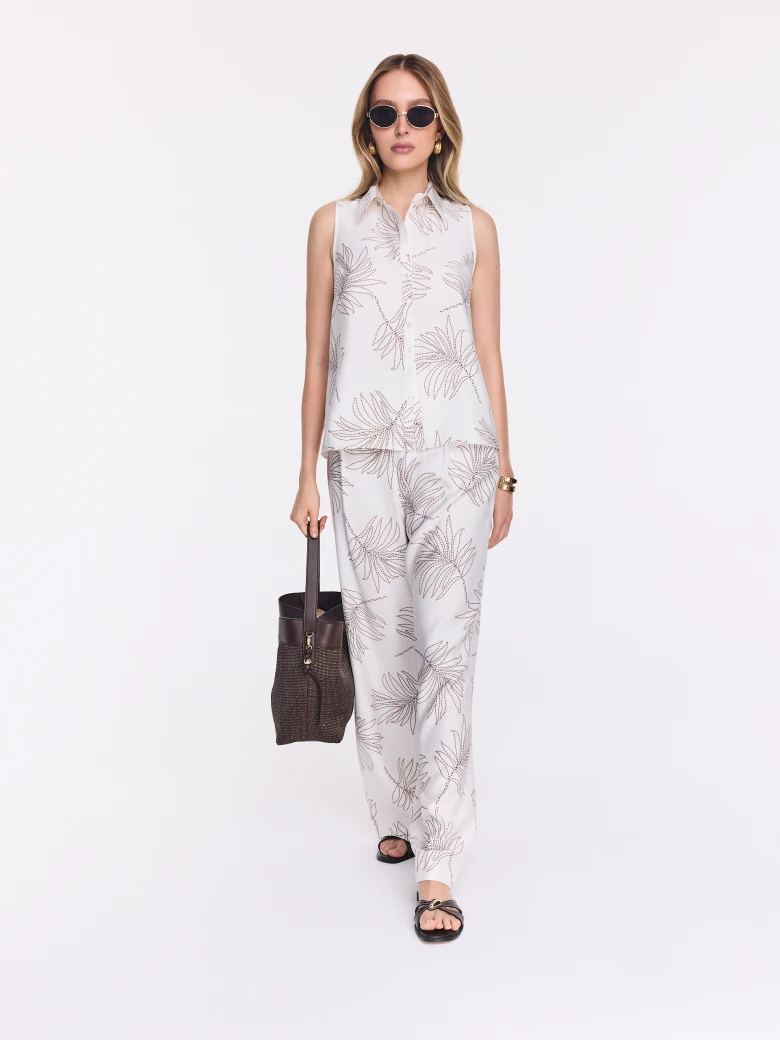 White wide-leg pants with a floral print