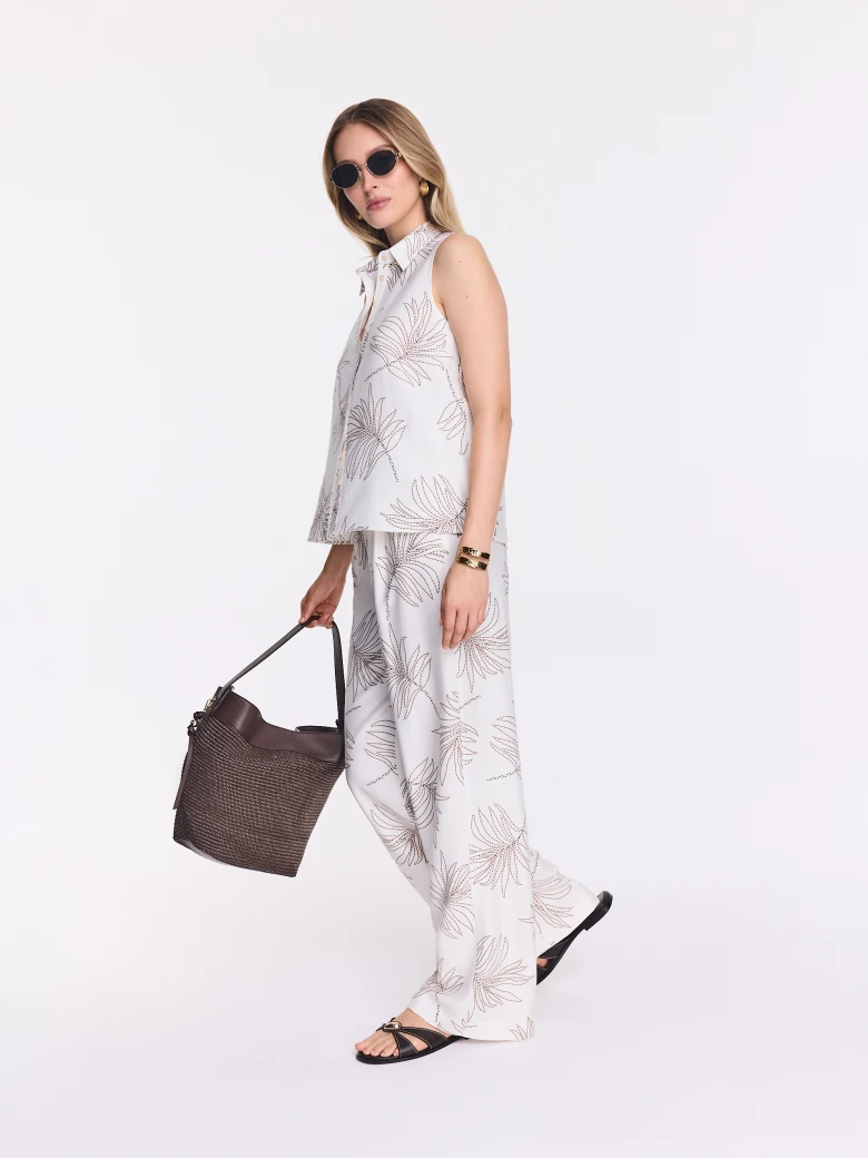 White wide-leg pants with a floral print