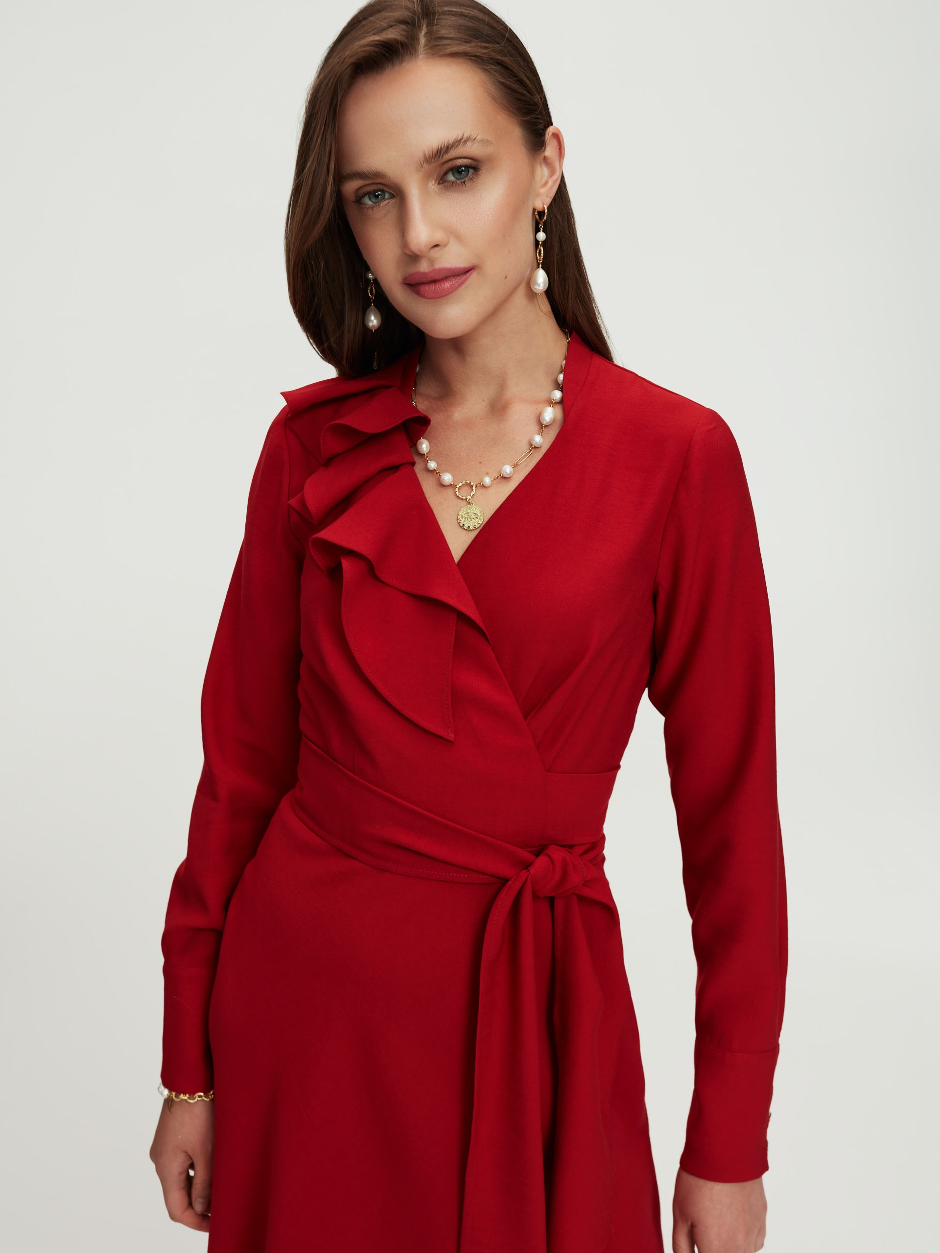 Red dress with a ruffle at the neckline