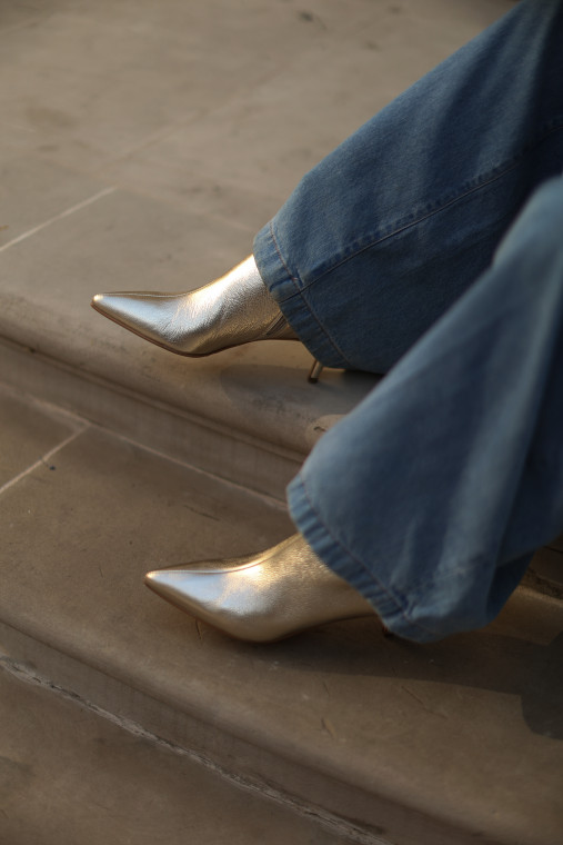 Gold leather stiletto boots