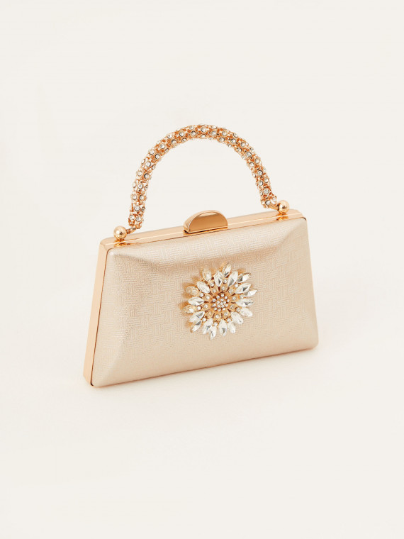 Handbag in gold color with jewelry embellishment