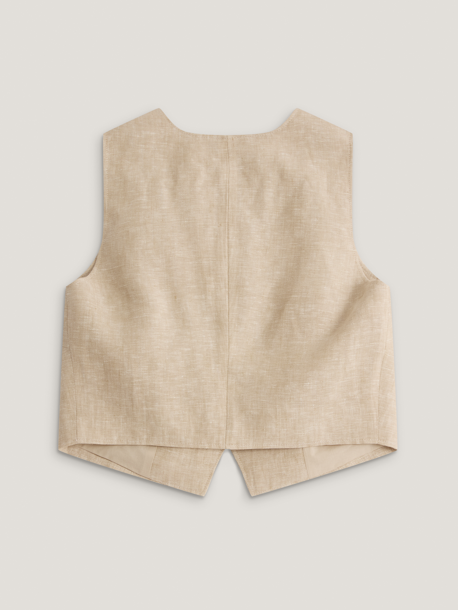An asymmetrical linen waistcoat in beige - Taranko