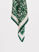 An elegant silk blouse with a floral print