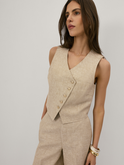 An asymmetrical linen waistcoat in beige - Taranko