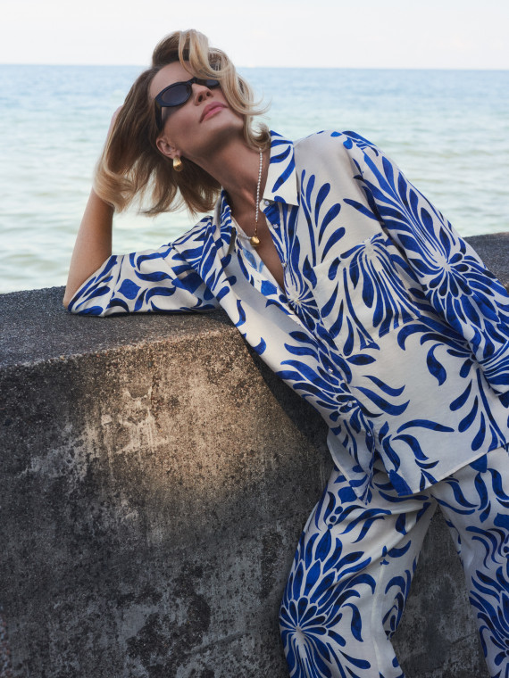 White oversized shirt with an ornamental pattern