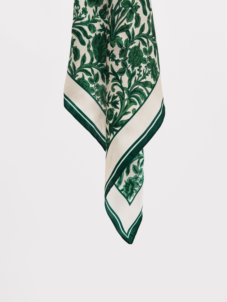 An elegant silk blouse with a floral print